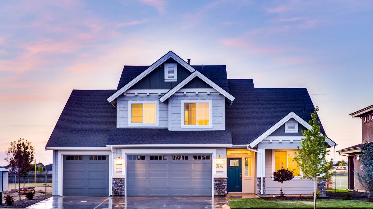 Family home at dusk representing a first mortgage purchase